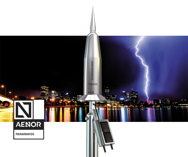Lightning rod in front of a city skyline with a lightning bolt in the sky